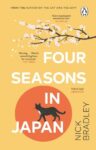 Four Seasons in Japan by Bradley shows a branch of cherry blossoms and a black cat.