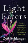 The Light Eaters: How the Unseen World of Plant Intelligence Offers a New Understanding of Life on Earth by Zoe Schlanger. This book cover shows the image of a pink plant called a sundew (Drosera), a type of carnivorous plant.